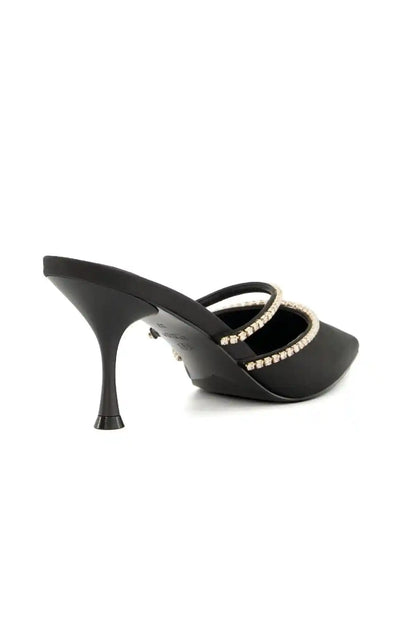 Dune London black heeled mules showing curved topline and rhinestone trim