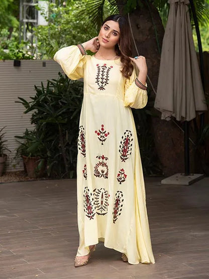 Pale yellow embroidered long dress, gathered long sleeves, detailed chest embroidery