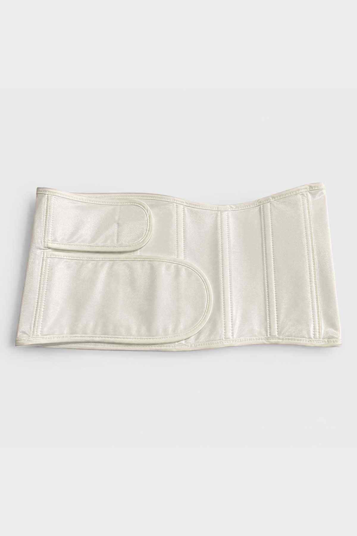 Cream belly band flat lay with curved stitched detail and vertical seams