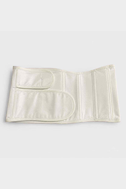 Cream belly band flat lay with curved stitched detail and vertical seams