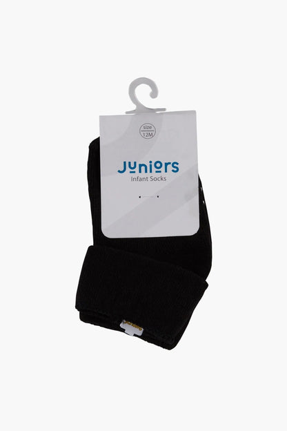 Black infant socks with brand tag and small logo patch at cuff