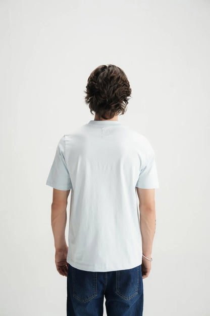 Light blue crew-neck short-sleeve T-shirt on model, back view