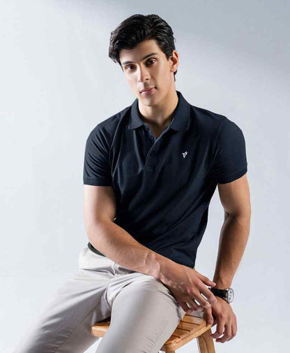 Dark fitted polo shirt with short sleeves, button placket, and small chest logo