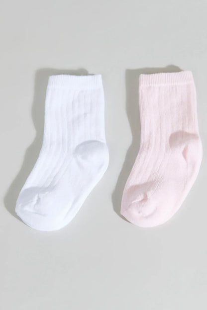 Baby ankle socks, one white and one light pink, ribbed knit