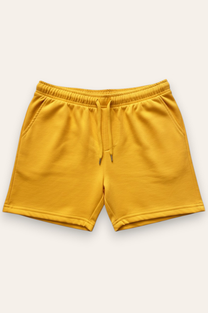 Yellow drawstring shorts with elastic waistband, front view
