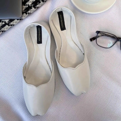 Jooti Shooti off-white slip-on flats, rounded toe with black interior tag
