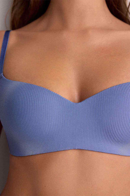 Women's blue ribbed bra cups with scalloped neckline and V-shaped center seam