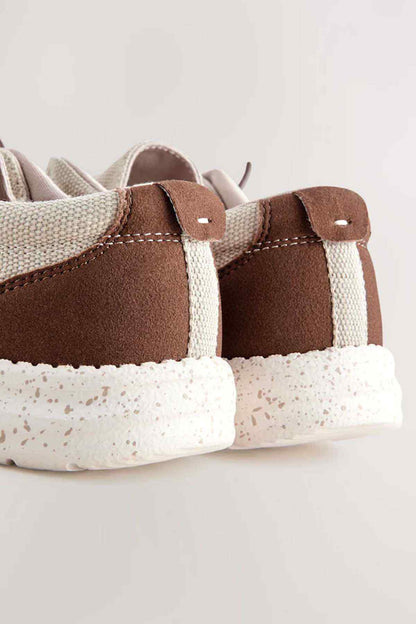 Brown and beige sneakers with speckled outsole and side tabs