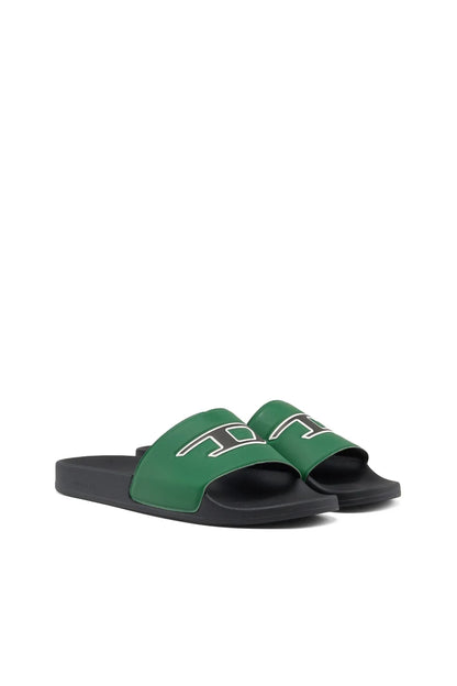 Green slide sandal with black sole and white logo on front strap
