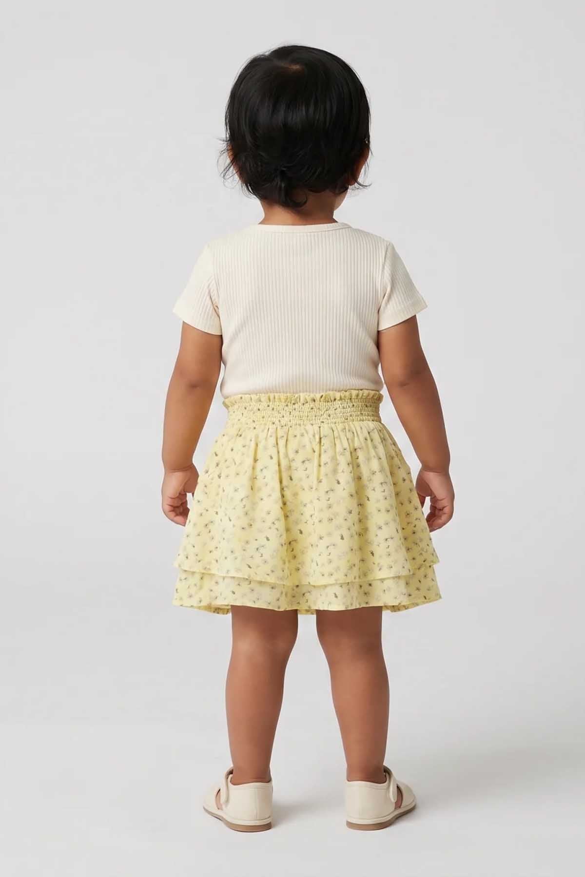 Baby skirt yellow micro-pattern with elastic waist and layered tiers