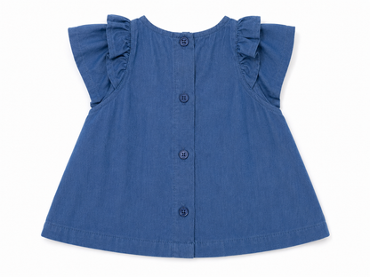 Blue denim baby dress with cap sleeves, ruffled shoulders, and button front