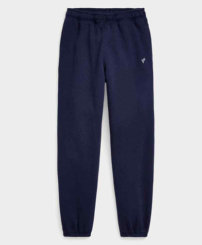 Navy jogger pants with drawstring waist, tapered fit, and cuffed hems