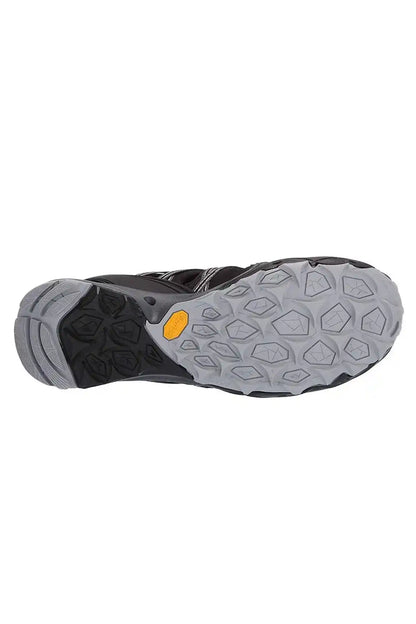 Trail sneaker outsole with gray traction lugs and yellow comfort insert