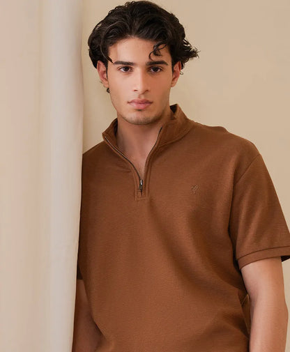 Fitted half-zip short-sleeve shirt in brown, front view with half zipper