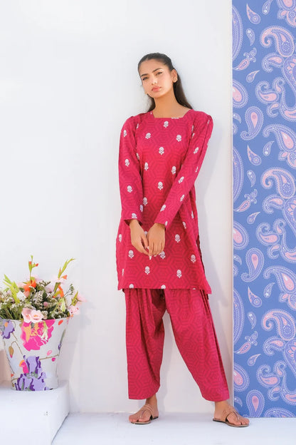 Pink printed long kurta and matching patterned pants, round neck, full front.