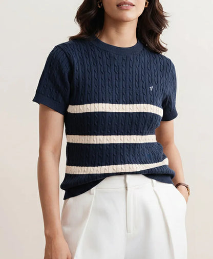 Navy cable-knit fitted top with short sleeves, crew neck, and cream striped band