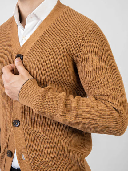 Brumano brown cotton cardigan sleeve close-up with buttoned cuffs and knit texture