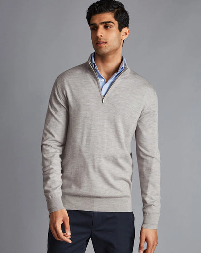 Men's grey quarter-zip knit sweater with ribbed cuffs and collar