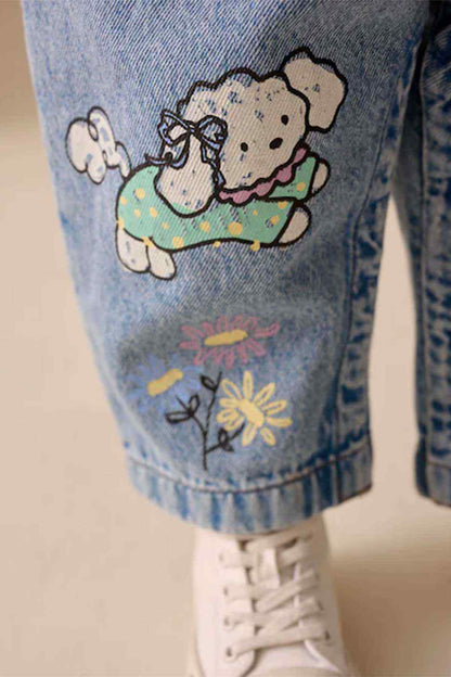 Denim overalls leg with puppy graphic, colorful flowers, and bow embroidery