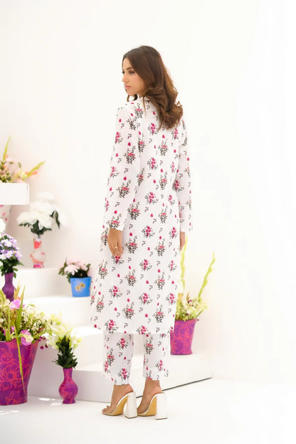 Floral maxi dress with long sleeves, white base with red floral print, side view