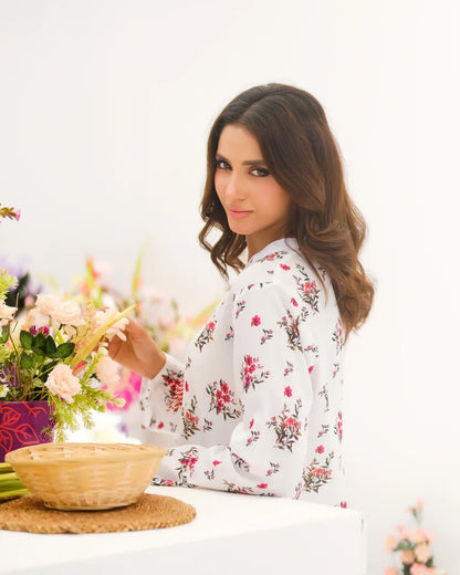 Floral maxi dress close-up, long sleeves, white base with red floral pattern