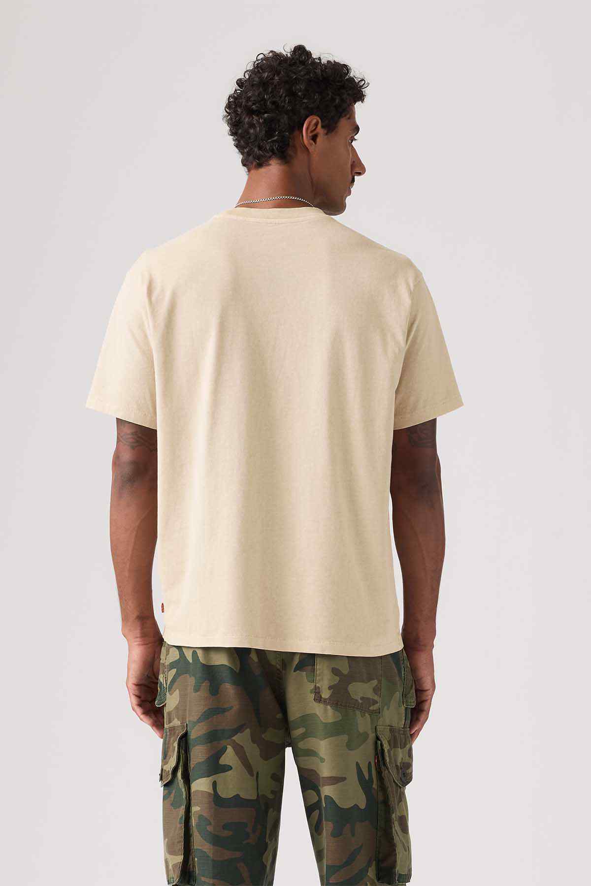 Men's beige crewneck short-sleeve T-shirt, back view with camo cargo shorts