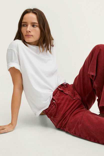 Red wide-leg denim jeans with stitched waistband and front seams