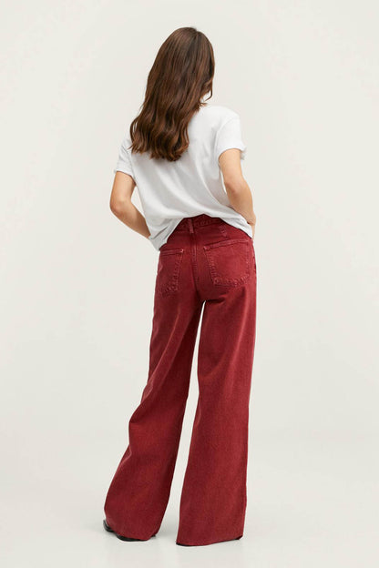 Red wide-leg denim jeans with relaxed fit and back pockets