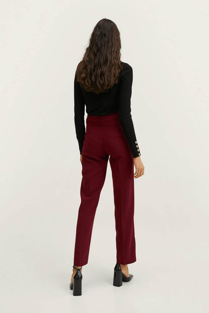 Plum high-rise tailored trousers, side view with tapered leg and cuff