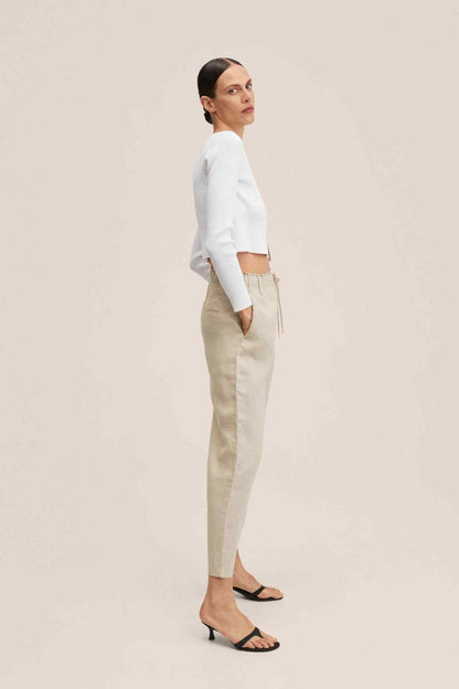 Light pastel grey drawstring trousers, full side view, cuffed cropped hems