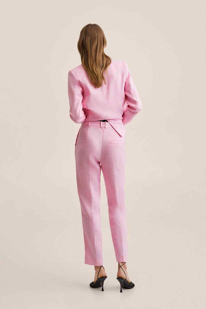 Pink tailored trousers from back view with belt loops and slim ankle-length cut