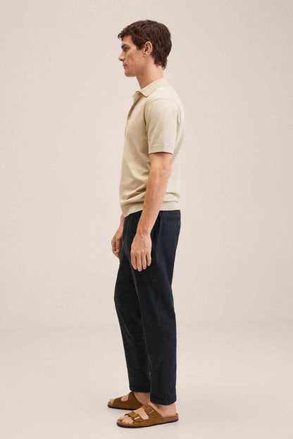 Dark navy drawstring trousers, side view with ankle-length hem