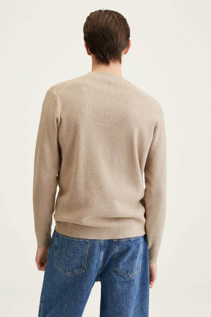 Beige knit sweater back view, crew neck and long sleeves