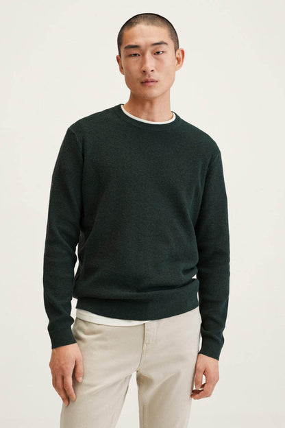 Men's dark green crewneck sweatshirt, long sleeves, ribbed hem and cuffs.