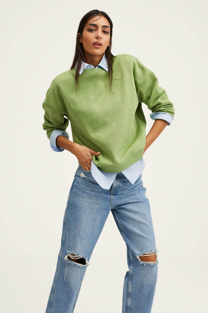Green crewneck sweatshirt with long sleeves, relaxed fit; shirt collar visible