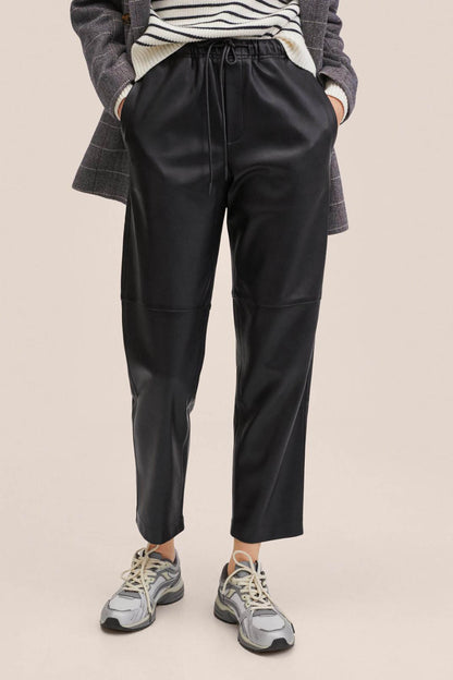Black drawstring trousers with elastic waistband and tapered ankle hem
