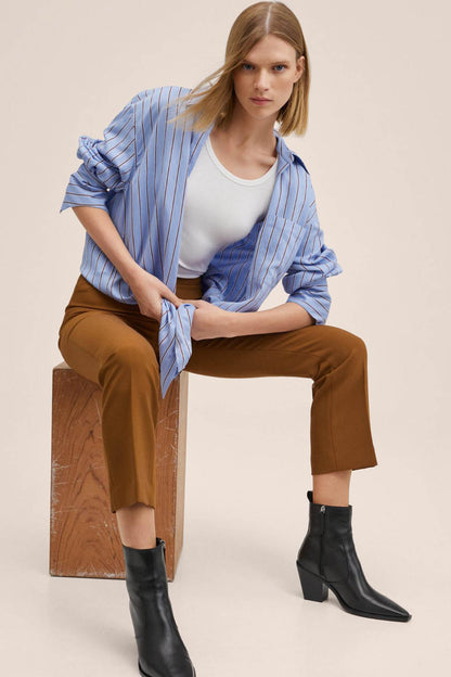 Cognac brown cropped straight-leg trousers with front seam and cuffed hem