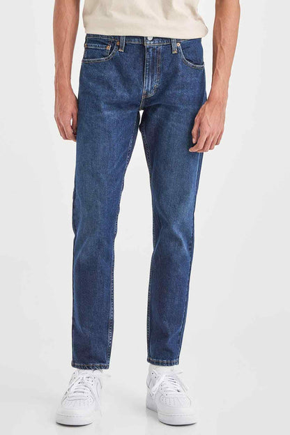 Levi's dark indigo jeans front view, straight-leg fit with visible stitching