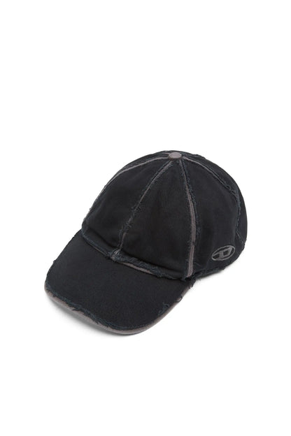 Black baseball cap with curved brim, stitched seams, and side logo