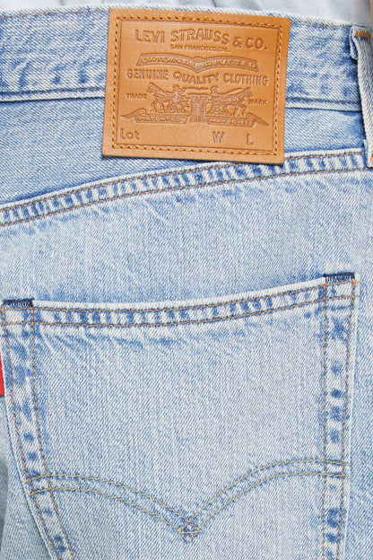 Levi's leather patch on light blue denim shorts waistband pocket