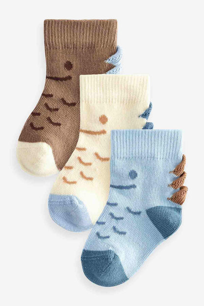 Four-pack kids' crew socks: brown, cream, light blue, blue with face patterns