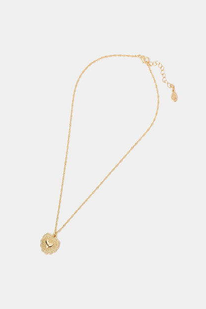 Gold chain necklace with circular charm pendant