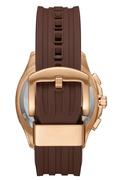Gold-tone watch with dark brown silicone strap and folding clasp, crown on right.