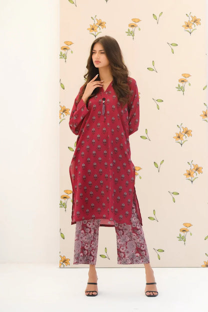 Red floral kurta set with V-neck and button placket, paired with printed pants
