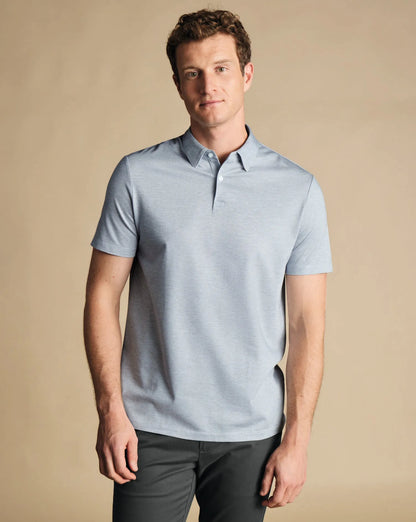 Charles Tyrwhitt light blue polo shirt with short sleeves and button placket