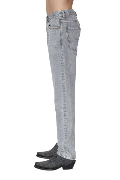 Diesel light grey denim jeans, side view, back pocket and tapered leg