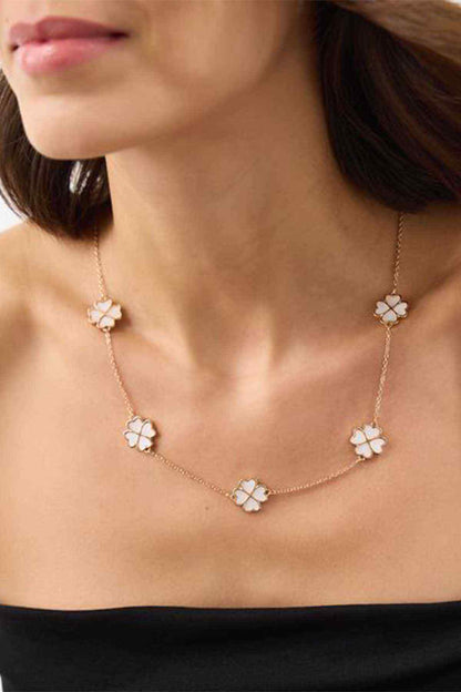 Gold-tone floral charm necklace with five clover flower stations
