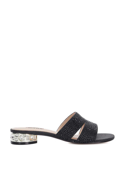 Black slide sandal with textured strap and jeweled block heel, side view