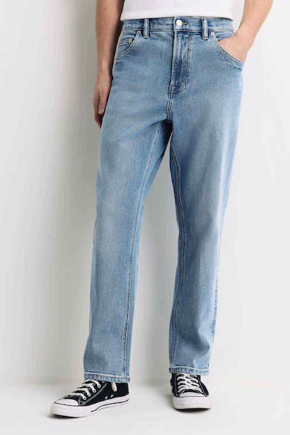 Light blue denim jeans full view, straight-leg with button fly and belt loops