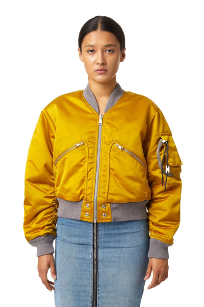 Yellow bomber jacket with zip front, snap pockets, gray ribbed collar and cuffs